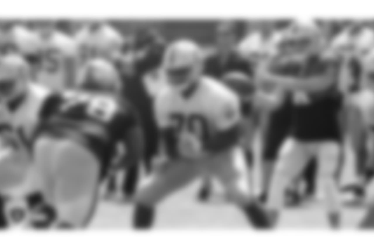 Oakland Raiders defensive tackle Justin Ellis (78) and offensive guard Kelechi Osemele (70) on the field for practice at 2018 Training Camp at The Oakland Raiders Napa Valley Training Complex, Monday, August 6, 2018, in Napa, California.