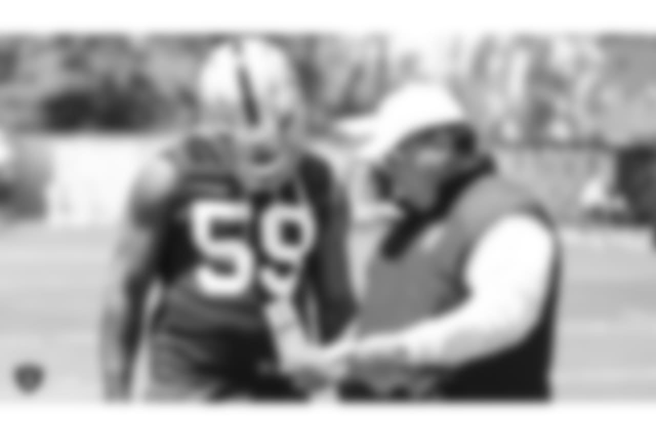 Oakland Raiders linebacker Tahir Whitehead (59) and defensive coordinator Paul Guenther at a Mandatory Mini Camp at the Oakland Raiders Practice Facility, Tuesday, June 12, 2018, in Alameda, California.