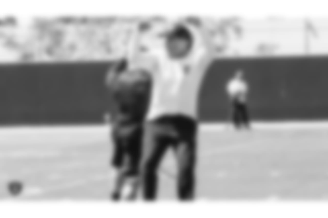 Oakland Raiders head coach Jon Gruden and strength and conditioning assistant Deuce Gruden at an Organized Team Activity (OTA) at the Oakland Raiders Practice Facility, Tuesday, May 29, 2018, in Alameda, California.