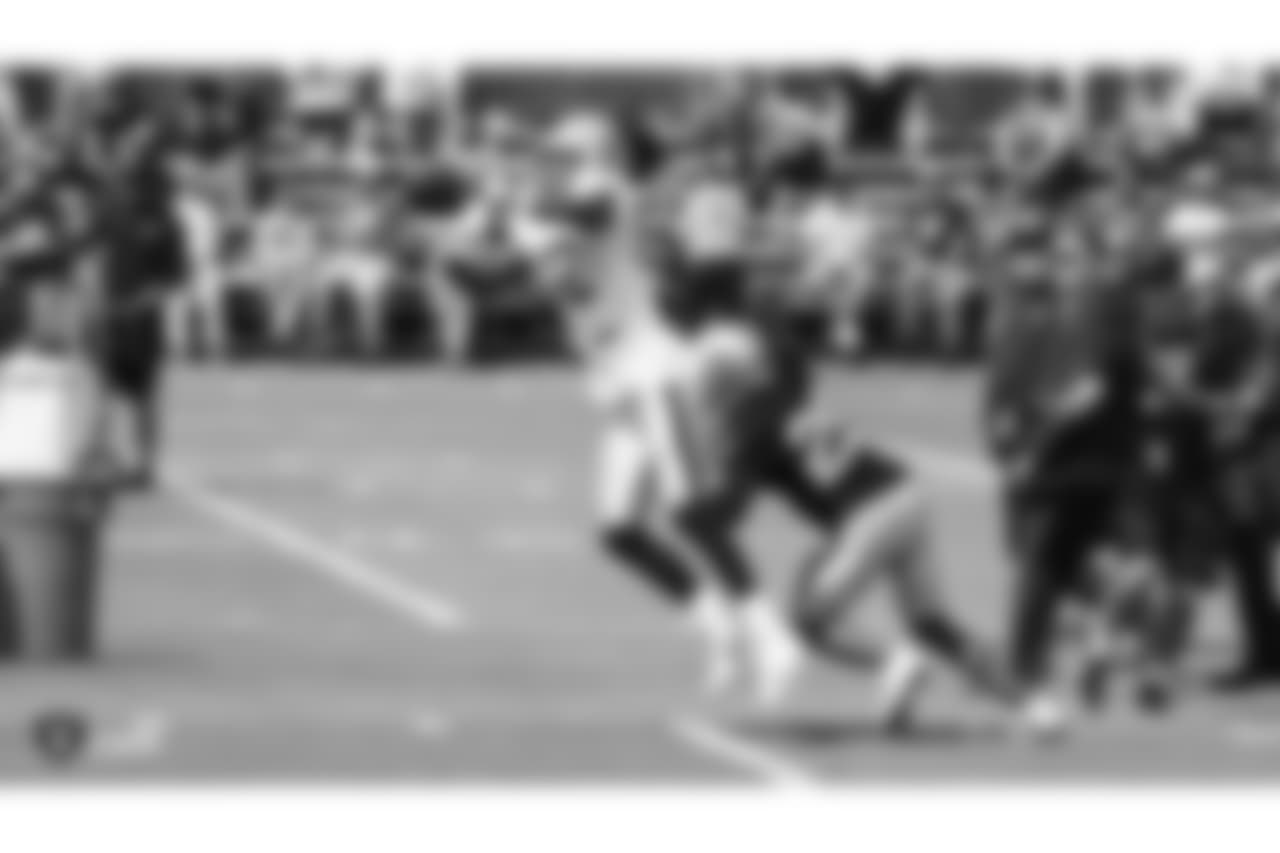Oakland Raiders wide receiver Martavis Bryant (12) with cornerback Leon Hall (29) on the field for practice at 2018 Training Camp at The Oakland Raiders Napa Valley Training Complex, Monday, August 6, 2018, in Napa, California.