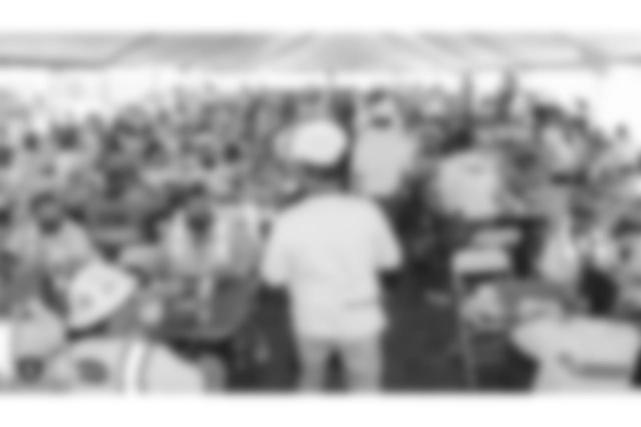 Oakland Raiders owner Mark Davis, president Marc Badain, and other staff members from The Oakland Raiders front office spend the day with construction workers of the Las Vegas Stadium worksite by handing out lunches and sharing a meal, Wednesday, June 28, 2018, at the Las Vegas Stadium worksite in Las Vegas, Nevada.