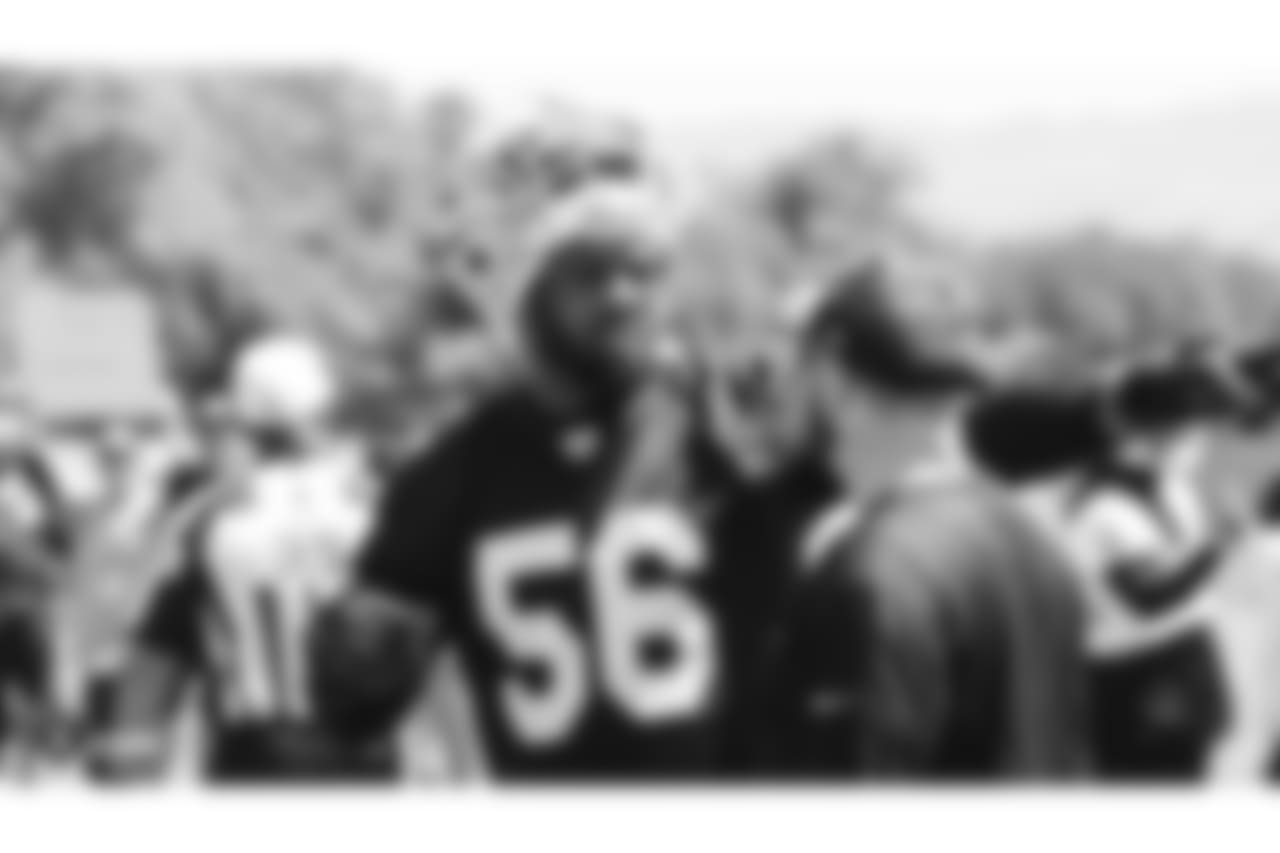 Oakland Raiders linebacker Derrick Johnson (56) and linebackers coach David Lippincott at an Organized Team Activity (OTA) at the Oakland Raiders Practice Facility, Tuesday, June 5, 2018, in Alameda, California.