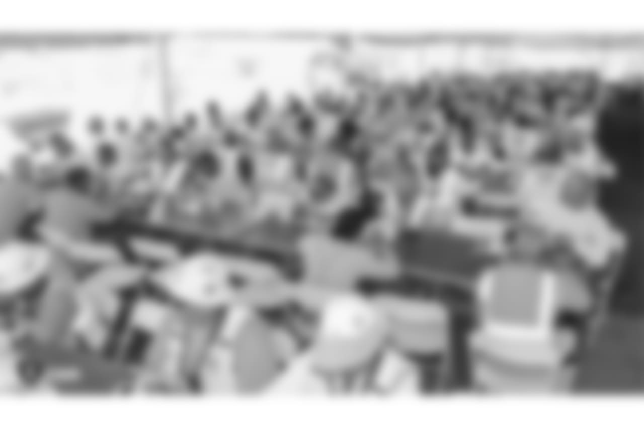 Staff members from The Oakland Raiders front office spend the day with construction workers of the Las Vegas Stadium worksite by handing out lunches and sharing a meal, Wednesday, June 28, 2018, at the Las Vegas Stadium worksite in Las Vegas, Nevada.