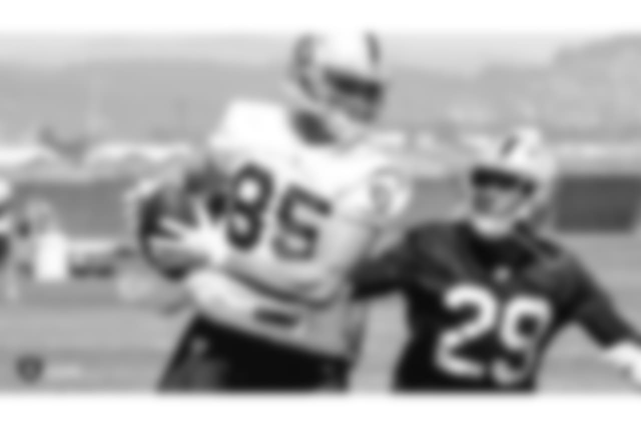 Oakland Raiders tight end Derek Carrier (85) and cornerback Leon Hall (29) at a Mandatory Mini Camp at the Oakland Raiders Practice Facility, Tuesday, June 12, 2018, in Alameda, California.