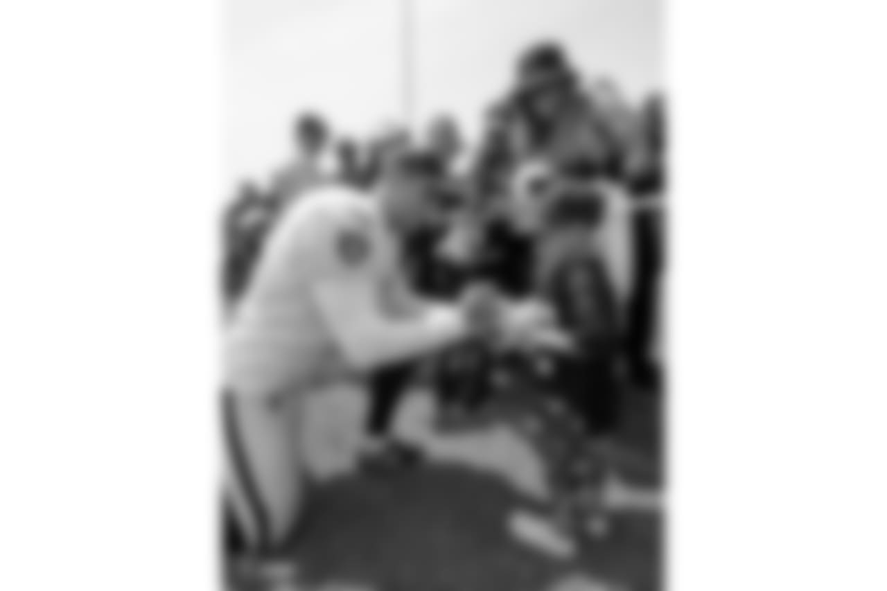 Oakland Raiders placekicker Giorgio Tavecchio (2) signs autographs for fans after practice at 2018 Training Camp at The Oakland Raiders Napa Valley Training Complex, Sunday, July 29, 2018, in Napa, California.