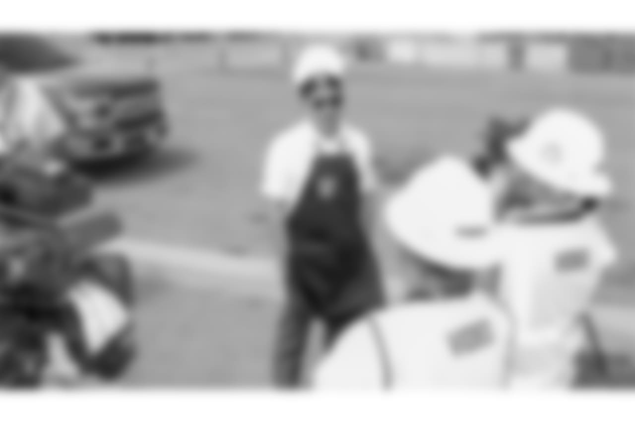 Oakland Raiders president, Marc Badain, and other staff members from The Oakland Raiders front office spend the day with construction workers of the Las Vegas Stadium worksite by handing out lunches and sharing a meal, Wednesday, June 28, 2018, at the Las Vegas Stadium worksite in Las Vegas, Nevada.