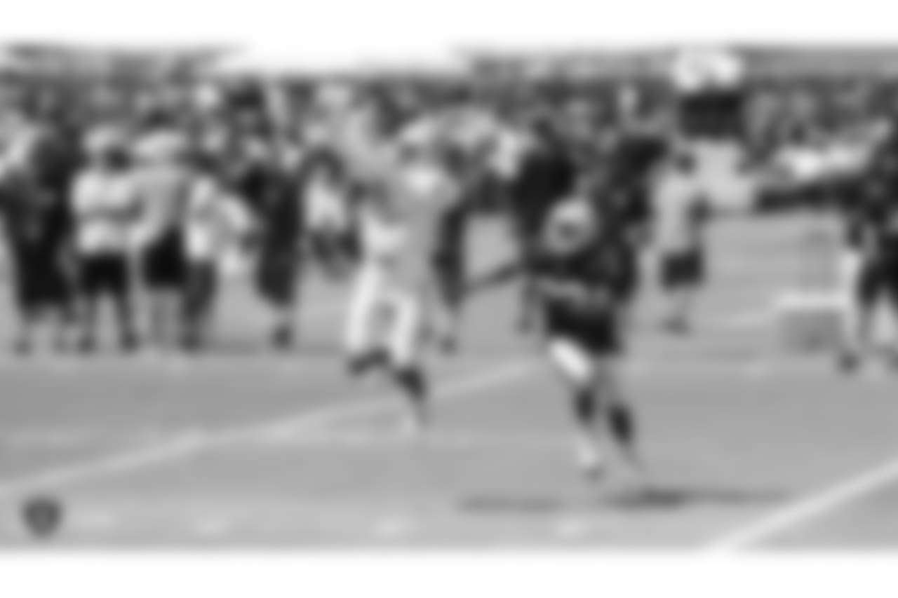 Oakland Raiders wide receiver Johnny Holton (16) with cornerback Dexter McDonald (32) on the field for practice at 2018 Training Camp at The Oakland Raiders Napa Valley Training Complex, Monday, August 6, 2018, in Napa, California.