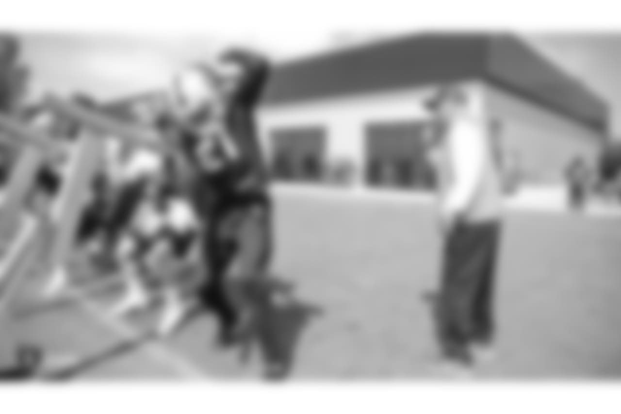 Oakland Raiders cornerback Gareon Conley (21) and assistant head coach Rich Bisaccia at an Organized Team Activity (OTA) at the Oakland Raiders Practice Facility, Wednesday, June 6, 2018, in Alameda, California.