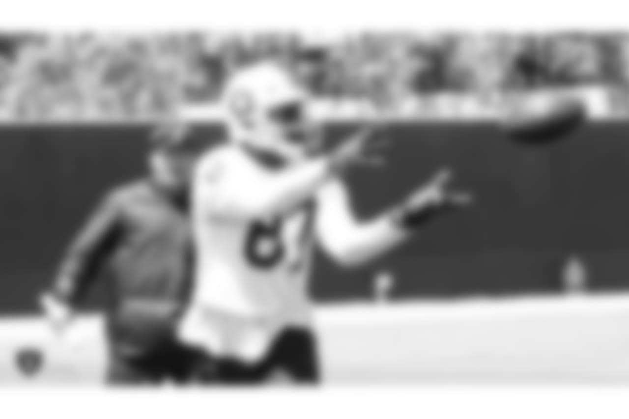Oakland Raiders head coach Jon Gruden and tight end Jared Cook (87) at an Organized Team Activity (OTA) at the Oakland Raiders Practice Facility, Thursday, May 31, 2018, in Alameda, California.