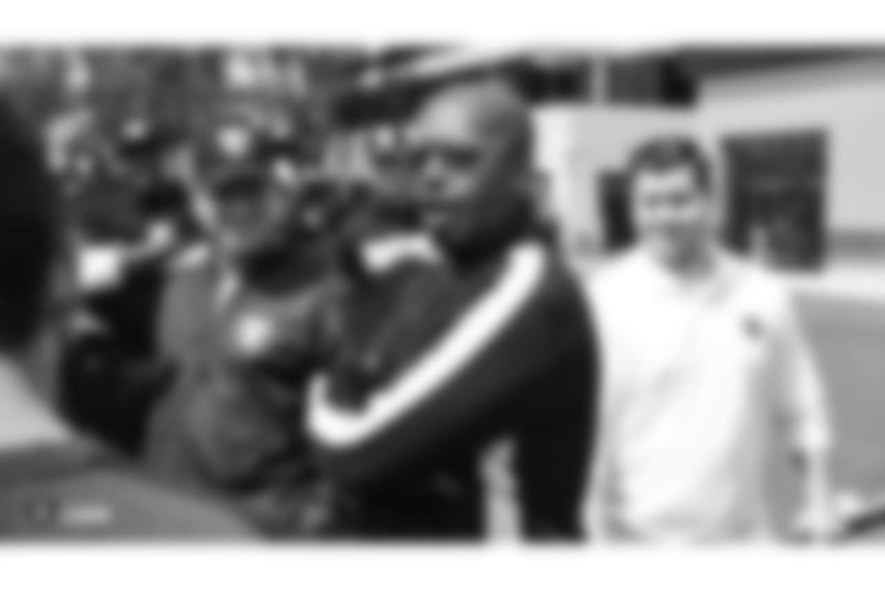 Hip-hop artist MC Hammer visits Oakland Raiders players at an Organized Team Activity (OTA) at the Oakland Raiders Practice Facility, Wednesday, June 6, 2018, in Alameda, California.