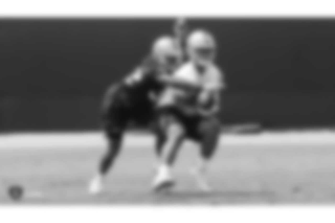Oakland Raiders defensive back Antonio Hamilton (32) and running back Chris Warren (34) at an Organized Team Activity (OTA) at the Oakland Raiders Practice Facility, Wednesday, June 6, 2018, in Alameda, California.