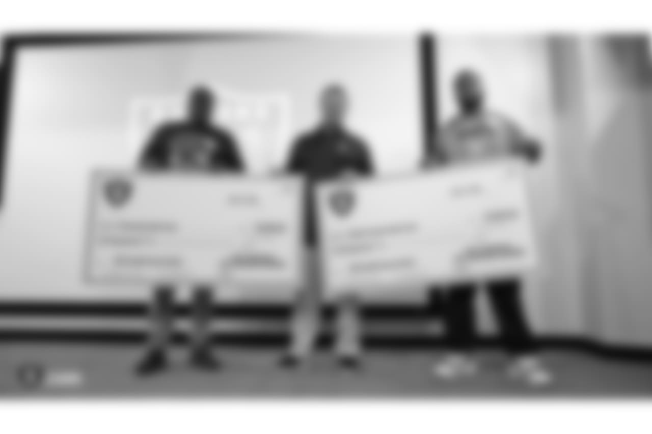 The Oakland Raiders and head coach Jon Gruden each match a $5000 donation by Dicks Sporting Goods Foundation's Sports Matters to both Oakland Tech High School and McClymonds High School's football programs. Accepting the donations were Oakland Tech High School's head coach Virdell Larkins Jr. and McClymonds High School's head coach Michael Peters, at the Oakland Raiders Practice Facility, Tuesday, July 17, 2018, in Alameda, California.