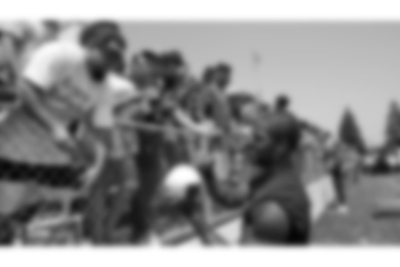 Oakland Raiders linebacker Tahir Whitehead (59) signs autographs for fans after practice at 2018 Training Camp at Memorial Stadium, Saturday, July 28, 2018, in Napa, California.
