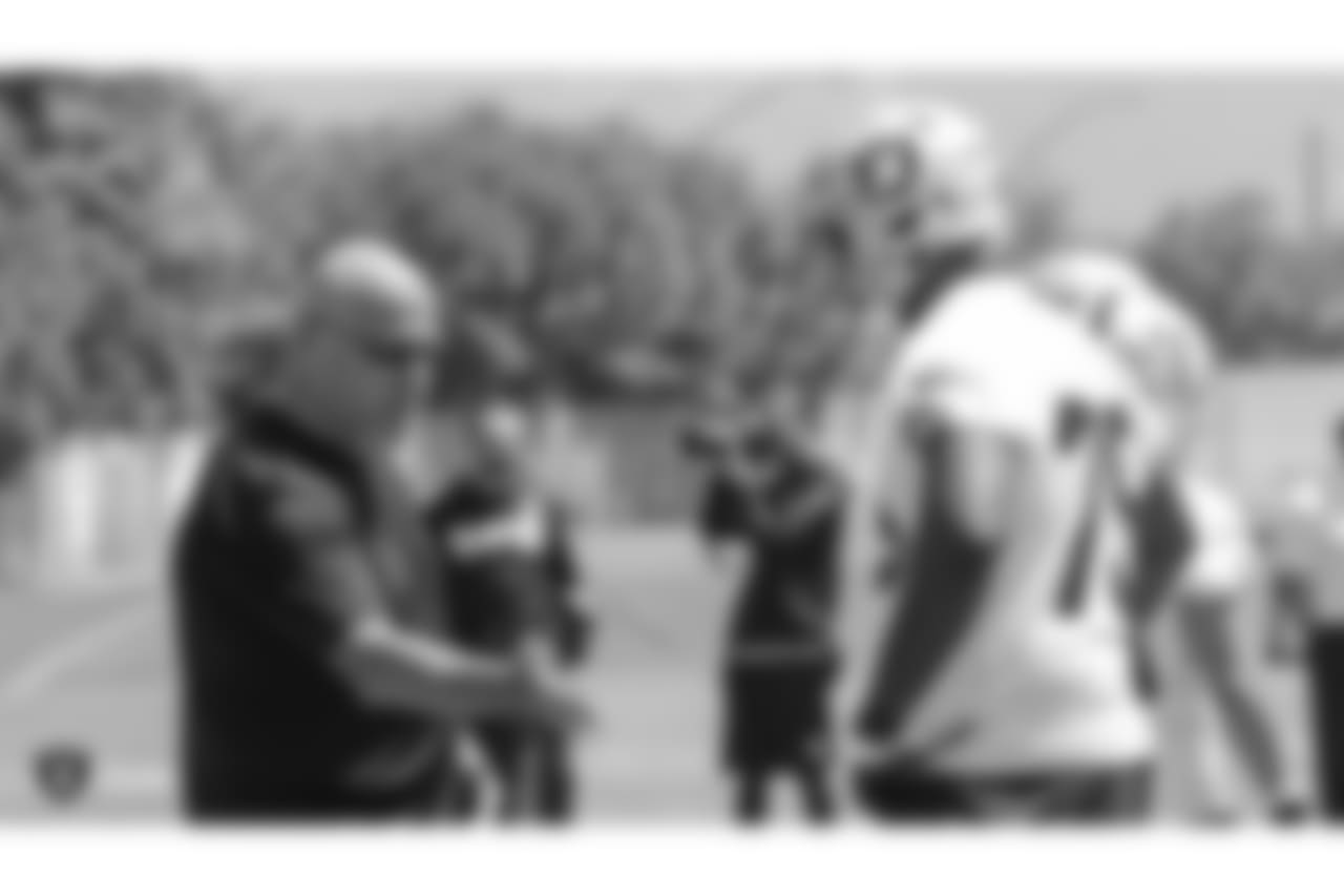 Oakland Raiders offensive line coach Tom Cable and offensive tackle Brandon Parker (75) at an Organized Team Activity (OTA) at the Oakland Raiders Practice Facility, Tuesday, June 5, 2018, in Alameda, California.
