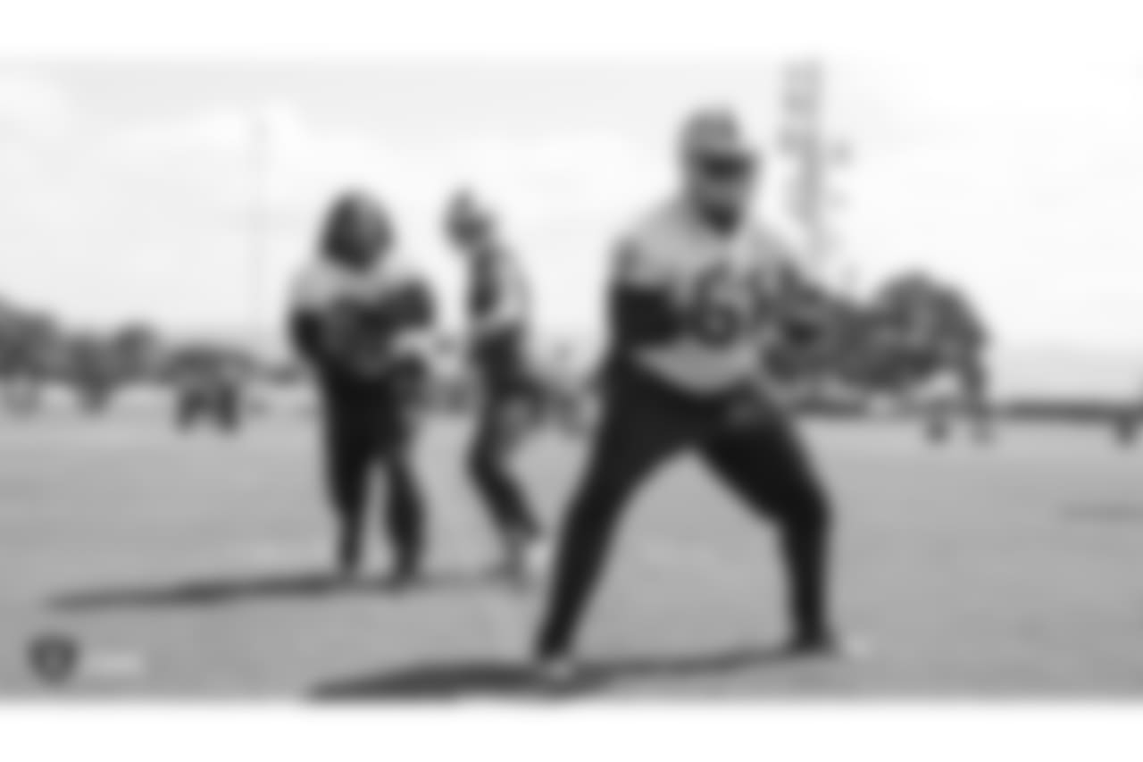 Oakland Raiders running back Marshawn Lynch (24), quarterback Derek Carr (4), and center Rodney Hudson (61) at an Organized Team Activity (OTA) at the Oakland Raiders Practice Facility, Thursday, May 31, 2018, in Alameda, California.