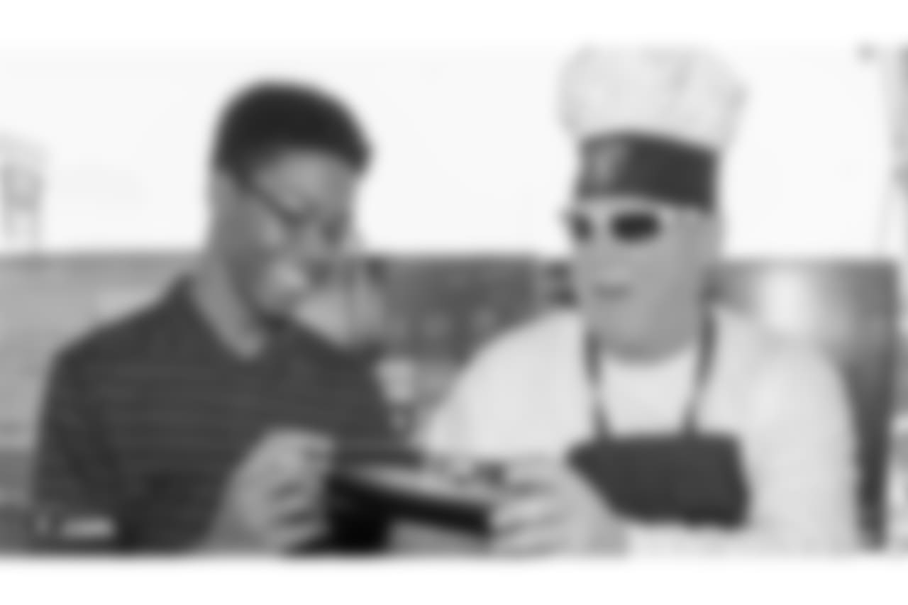 Oakland Raiders owner, Mark Davis, and other staff members from The Oakland Raiders front office spend the day with construction workers of the Las Vegas Stadium worksite by handing out lunches and sharing a meal, Wednesday, June 28, 2018, at the Las Vegas Stadium worksite in Las Vegas, Nevada.