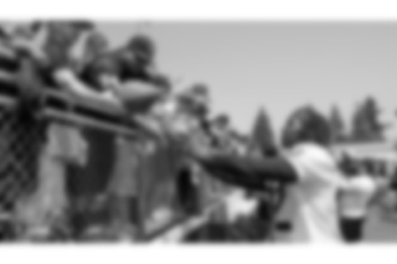 Oakland Raiders wide receiver Martavis Bryant (12) signs autographs for fans after practice at 2018 Training Camp at Memorial Stadium, Saturday, July 28, 2018, in Napa, California.