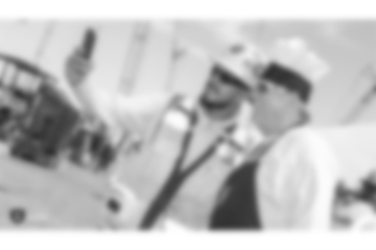 Oakland Raiders owner, Mark Davis, and other staff members from The Oakland Raiders front office spend the day with construction workers of the Las Vegas Stadium worksite by handing out lunches and sharing a meal, Wednesday, June 28, 2018, at the Las Vegas Stadium worksite in Las Vegas, Nevada.