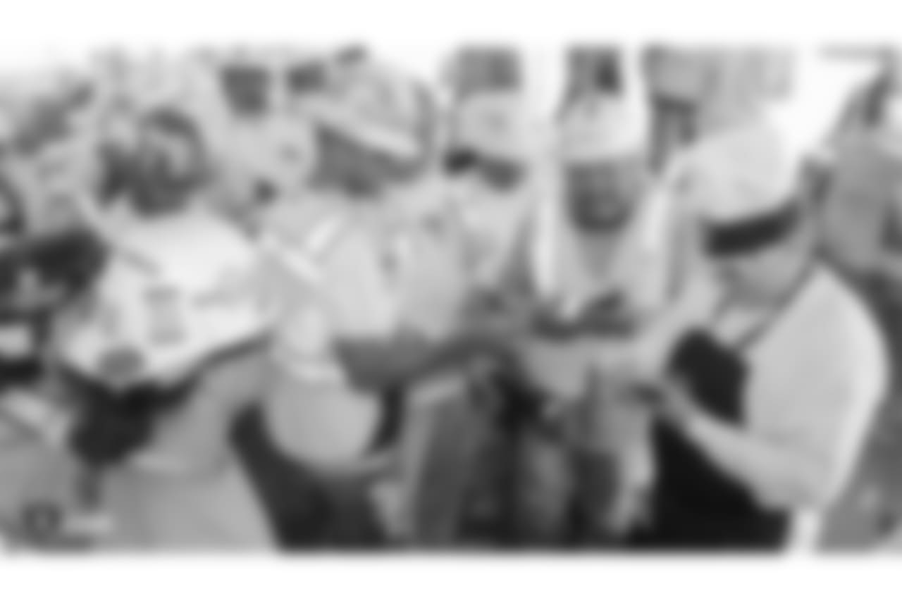 Oakland Raiders owner, Mark Davis, and other staff members from The Oakland Raiders front office spend the day with construction workers of the Las Vegas Stadium worksite by handing out lunches and sharing a meal, Wednesday, June 28, 2018, at the Las Vegas Stadium worksite in Las Vegas, Nevada.