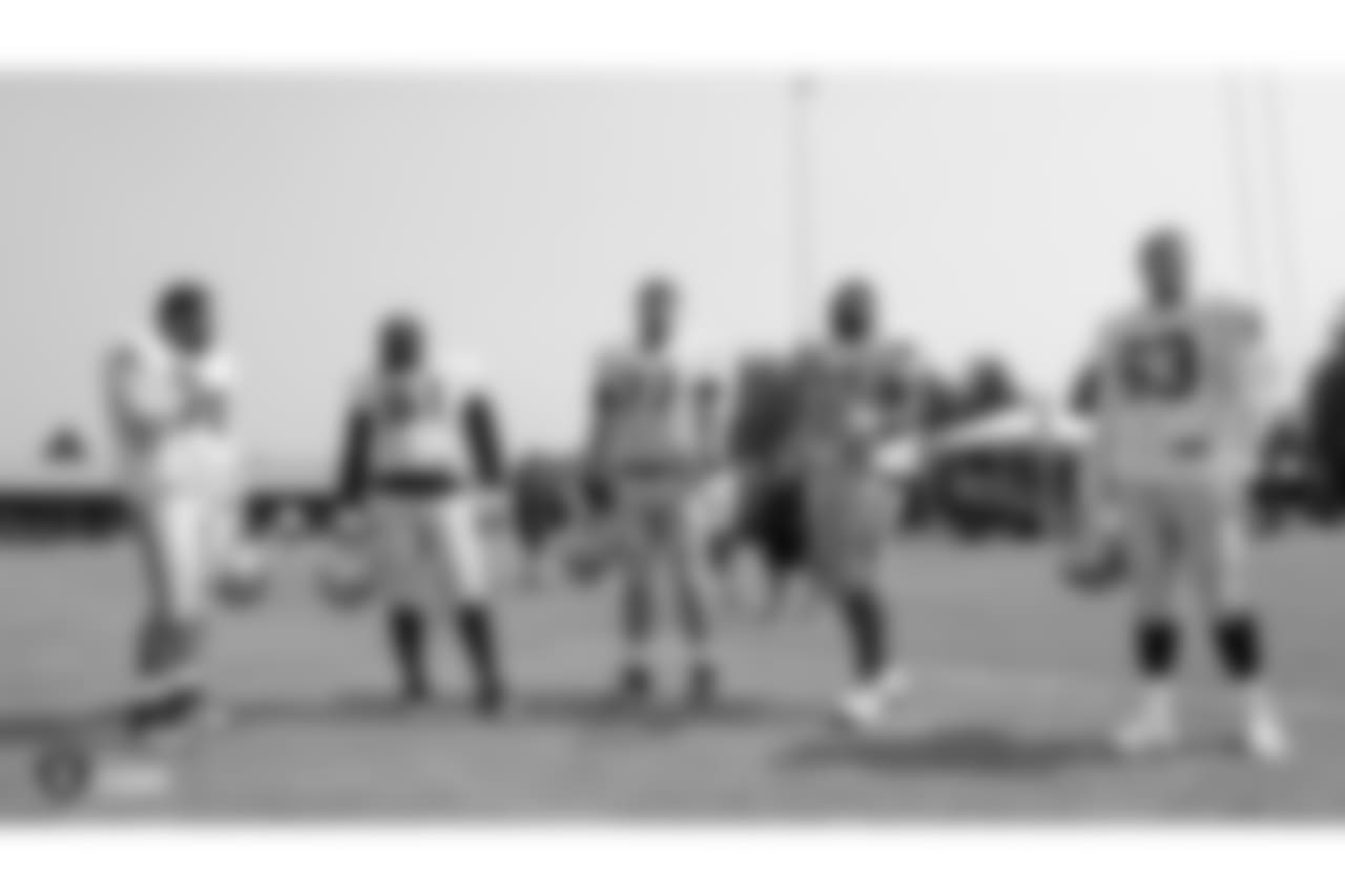 Oakland Raiders offensive guard Jon Feliciano (76), center Rodney Hudson (61), offensive tackle Kolton Miller (77), offensive guard Kelechi Osemele (70), and center Cameron Hunt (63) on the field for practice at 2018 Training Camp at The Oakland Raiders Napa Valley Training Complex, Wednesday, August 1, 2018, in Napa, California.