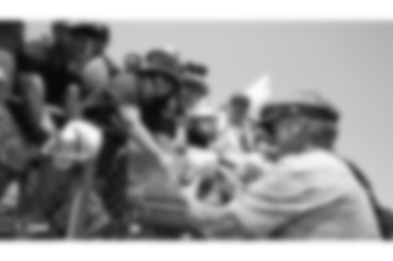 Oakland Raiders head coach Jon Gruden signs autographs for fans after practice at 2018 Training Camp at Memorial Stadium, Saturday, July 28, 2018, in Napa, California.