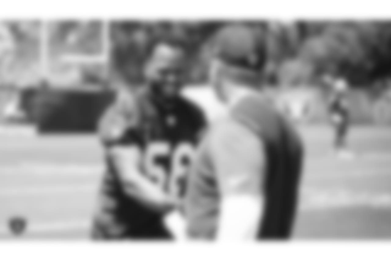 Oakland Raiders linebacker Derrick Johnson (56) and head coach Jon Gruden at a Mandatory Mini Camp at the Oakland Raiders Practice Facility, Tuesday, June 12, 2018, in Alameda, California.