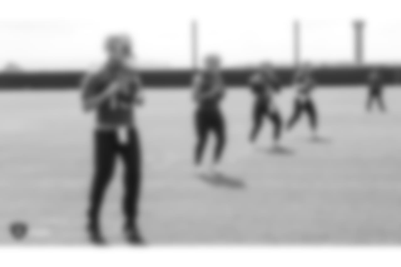 Oakland Raiders quarterback Connor Cook (18), quarterback Derek Carr (4), quarterback EJ Manuel (3), and quarterback Christian Hackenberg (7) at an Organized Team Activity (OTA) at the Oakland Raiders Practice Facility, Wednesday, June 6, 2018, in Alameda, California.