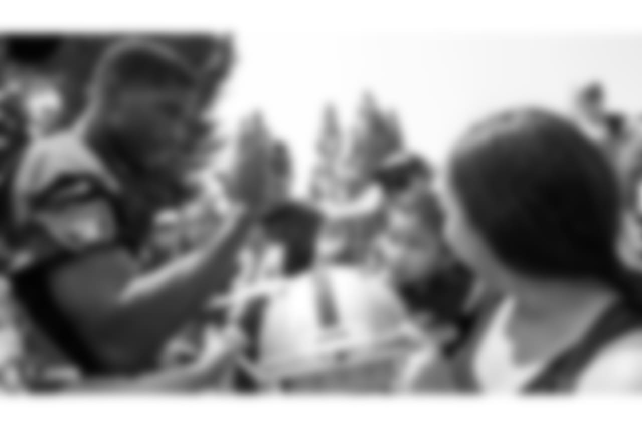 Oakland Raiders cornerback Rashaan Melvin (22) signs autographs for fans after practice at 2018 Training Camp at The Oakland Raiders Napa Valley Training Complex, Wednesday, August 1, 2018, in Napa, California.