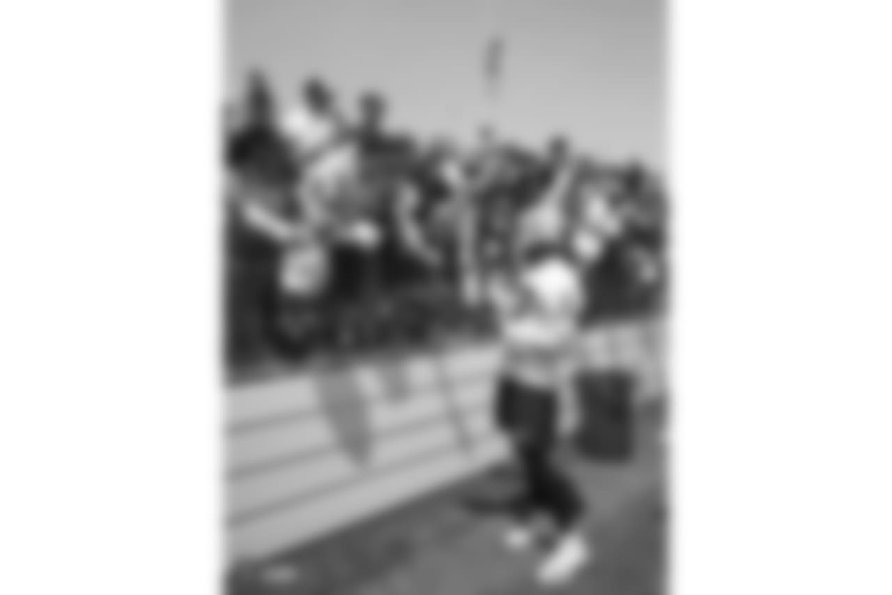 Oakland Raiders tight end Jared Cook (87) signs autographs for fans after practice at 2018 Training Camp at Memorial Stadium, Saturday, July 28, 2018, in Napa, California.