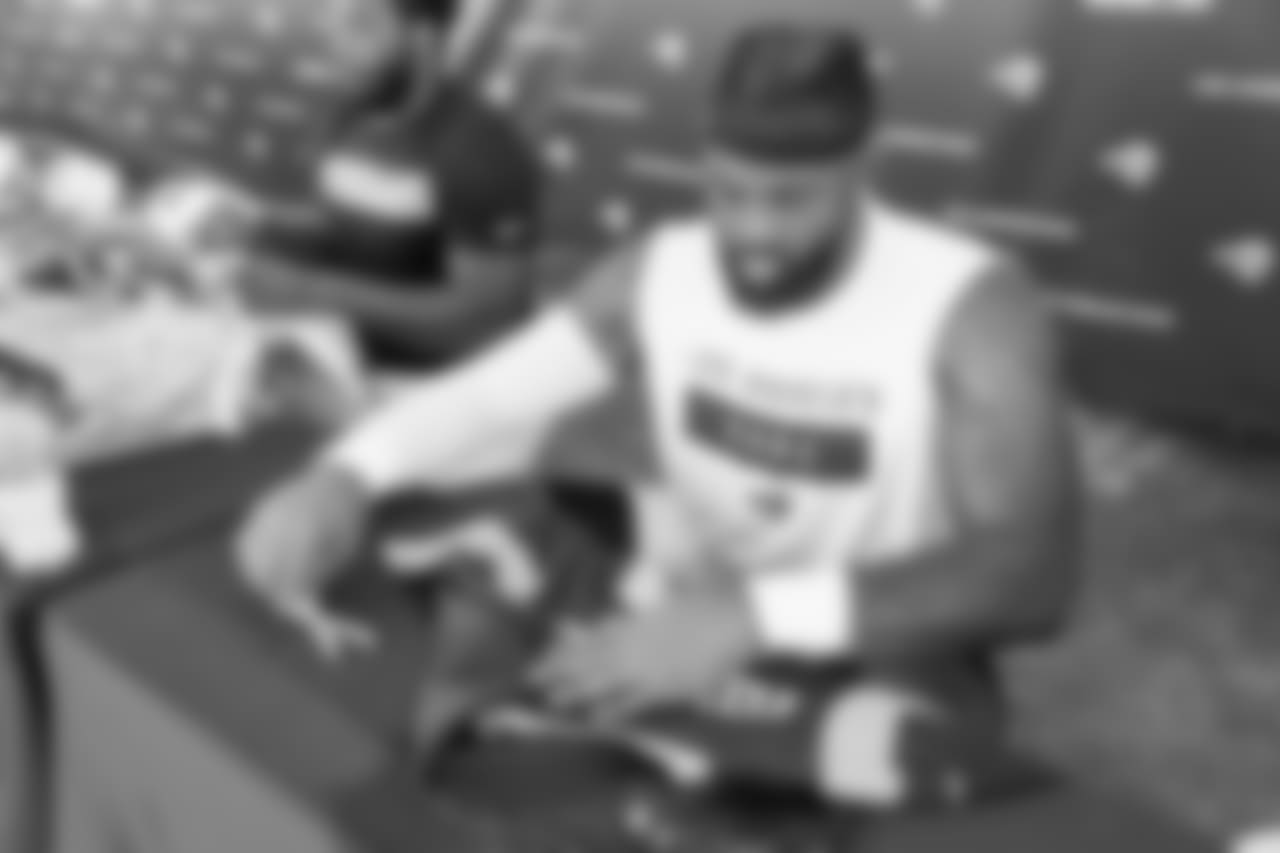 Defensive lineman (90) Michael Brockers of the Los Angeles Rams signs autographs during Day 5 of Training Camp, Monday, July 30, 2018, in Irvine, CA. (Will Navarro/Rams)