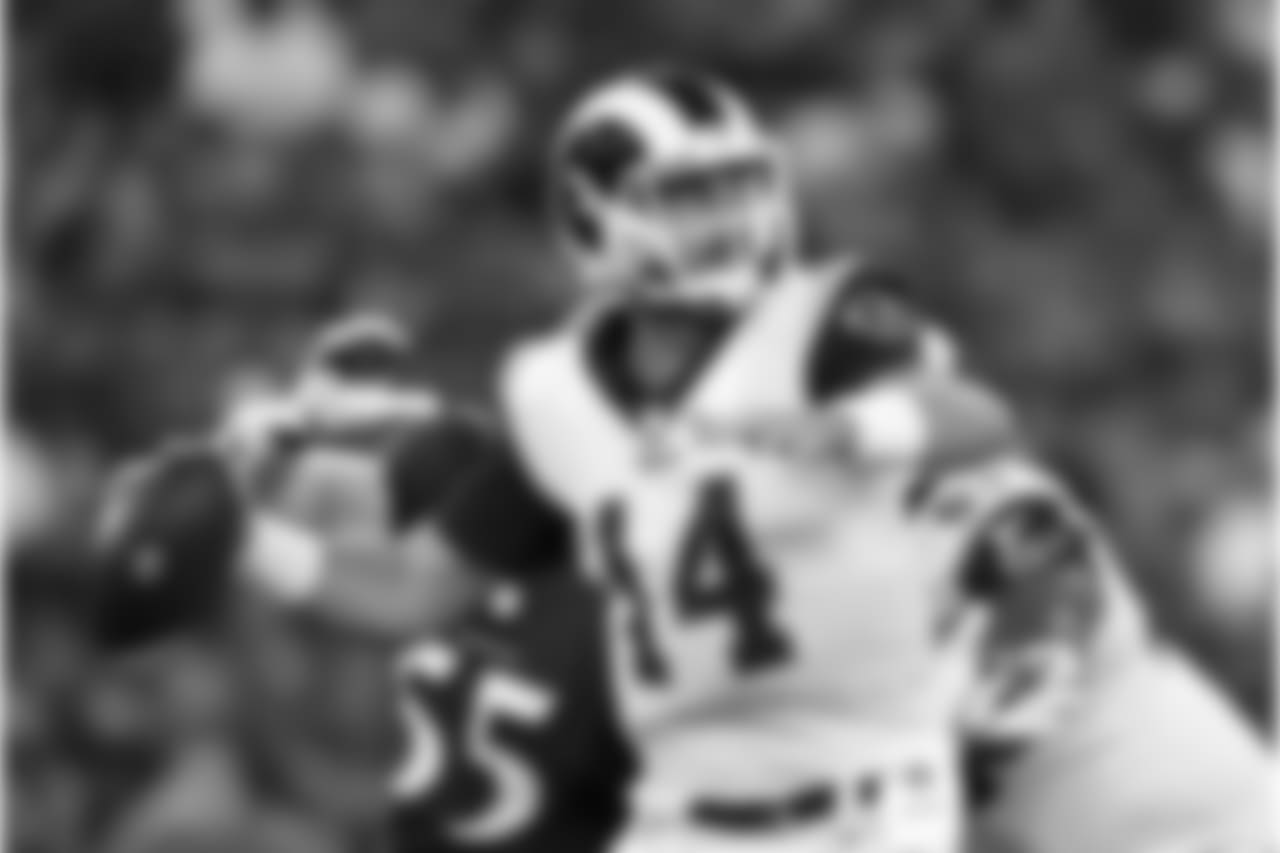 Los Angeles Rams quarterback Sean Mannion throws to a receiver in the first half of a preseason NFL football game against the Baltimore Ravens, Thursday, Aug. 9, 2018, in Baltimore. (AP Photo/Gail Burton)