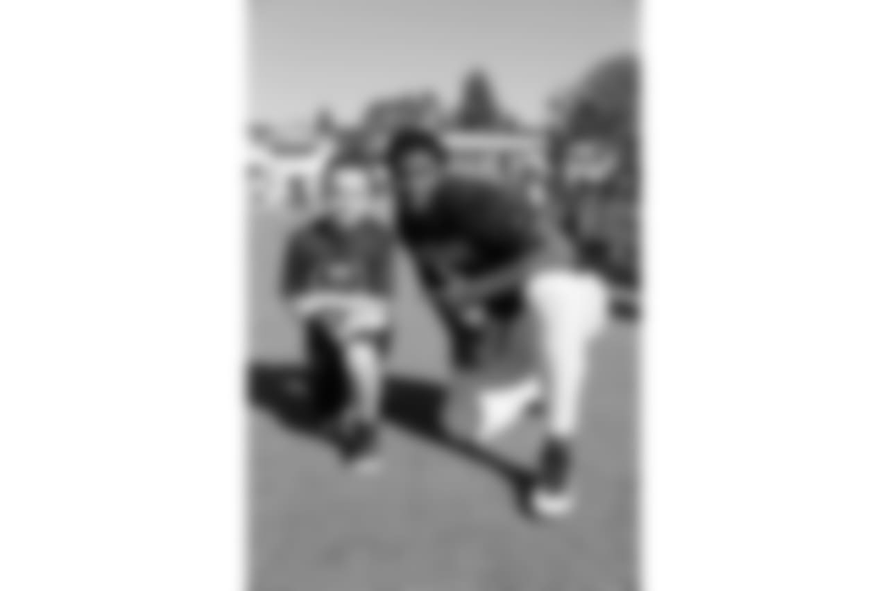 Defensive end (95) Ethan Westbrooks of the Los Angeles Rams takes a photo with fans during Day 5 of Training Camp, Monday, July 30, 2018, in Irvine, CA. (Will Navarro/Rams)