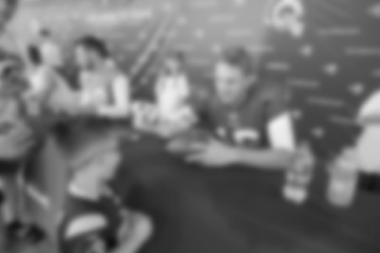 Quarterback (16) Jared Goff of the Los Angeles Rams signs autographs after practice on Day 4 of Training Camp, Sunday, July 29, 2018, in Irvine, CA. (Jeff Lewis/Rams)