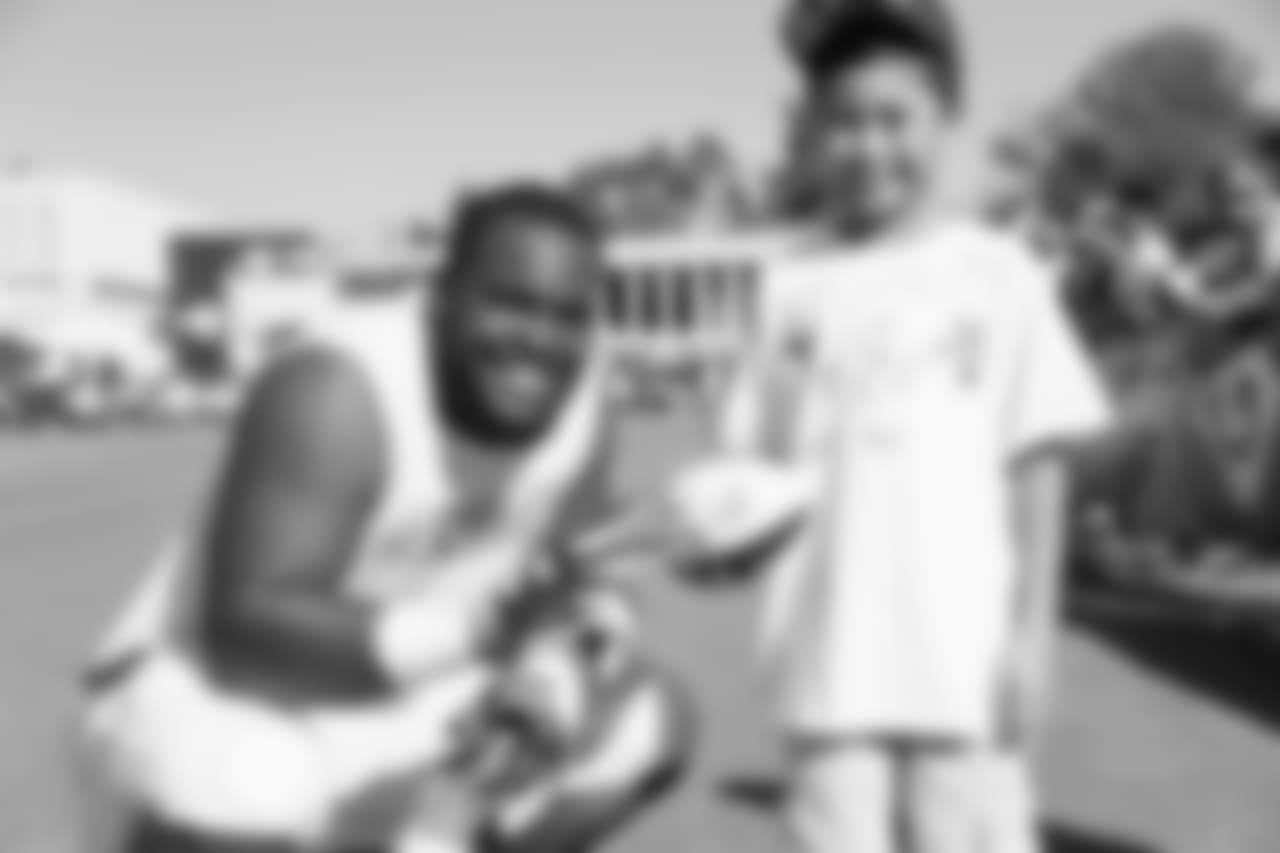 XX of the Los Angeles Rams takes a photo with fans during Day 5 of Training Camp, Monday, July 30, 2018, in Irvine, CA. (Will Navarro/Rams)