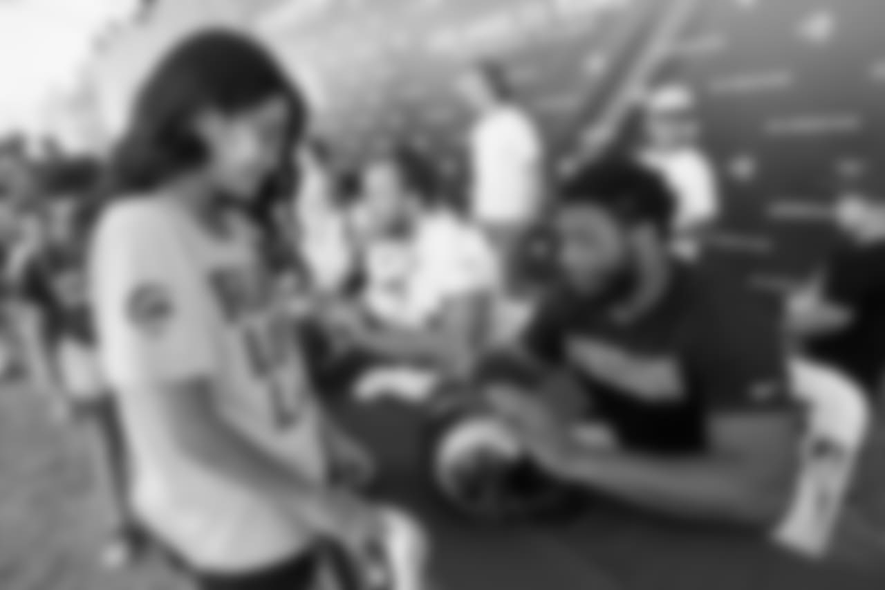 Defensive end (95) Ethan Westbrooks of the Los Angeles Rams signs autographs during Day 5 of Training Camp, Monday, July 30, 2018, in Irvine, CA. (Will Navarro/Rams)