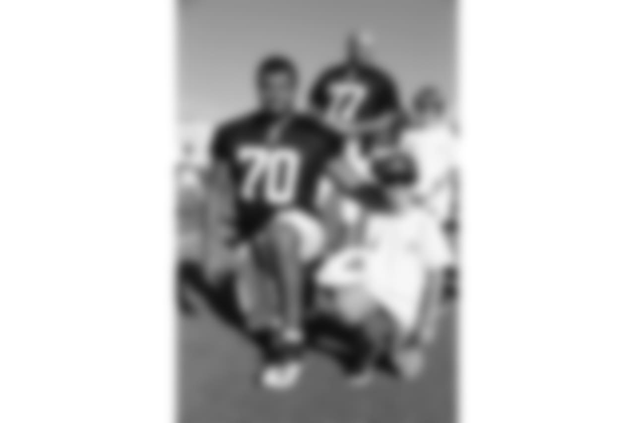 Tackle (70) Joseph Noteboom of the Los Angeles Rams takes a photo with fans during Day 6 of Training Camp, Wednesday, August 01, 2018, in Irvine, CA. (Will Navarro/Rams)