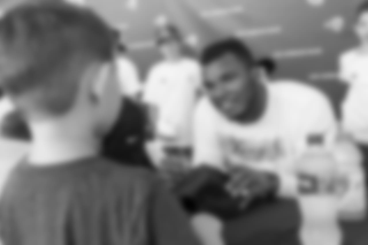 Defensive end (57) John Franklin-Myers of the Los Angeles Rams signs autographs during Day 5 of Training Camp, Monday, July 30, 2018, in Irvine, CA. (Will Navarro/Rams)