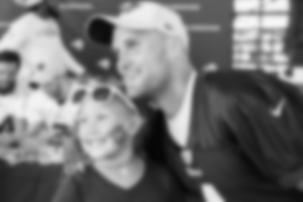 Kicker (04) Greg Zuerlein of the Los Angeles Rams takes a photo with a fan during Day 1 of Training Camp, Thursday, July 26, 2018, in Irvine, CA. (Will Navarro/Rams)