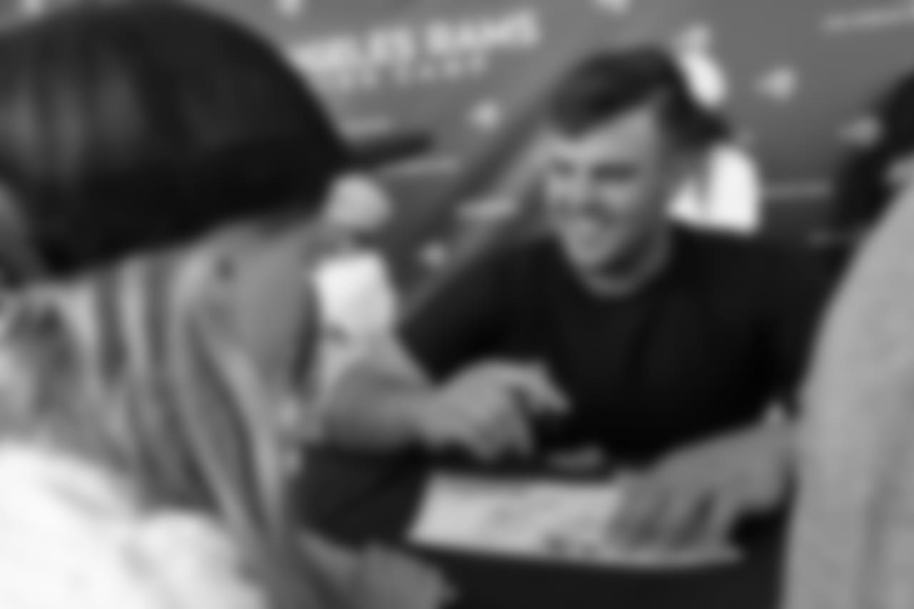 Center (66) Austin Blythe of the Los Angeles Rams signs autographs during Day 6 of Training Camp, Wednesday, August 01, 2018, in Irvine, CA. (Will Navarro/Rams)