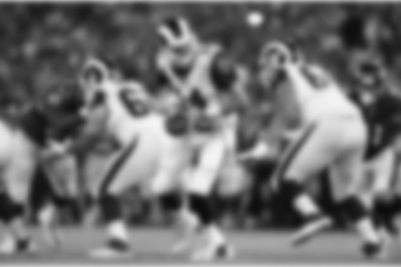 Los Angeles Rams quarterback Sean Mannion (14) drops back from the line of scrimmage in the first half of a preseason NFL football game against the Baltimore Ravens, Thursday, Aug. 9, 2018, in Baltimore. (AP Photo/Gail Burton)