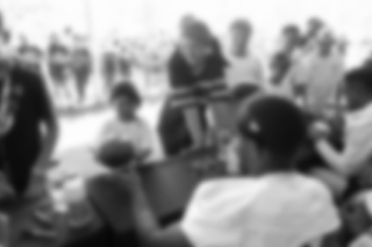 A Los Angeles Rams fan receives an autographs during Day 3 of Training Camp, Saturday, July 28, 2018, in Irvine, CA. (Will Navarro/Rams)