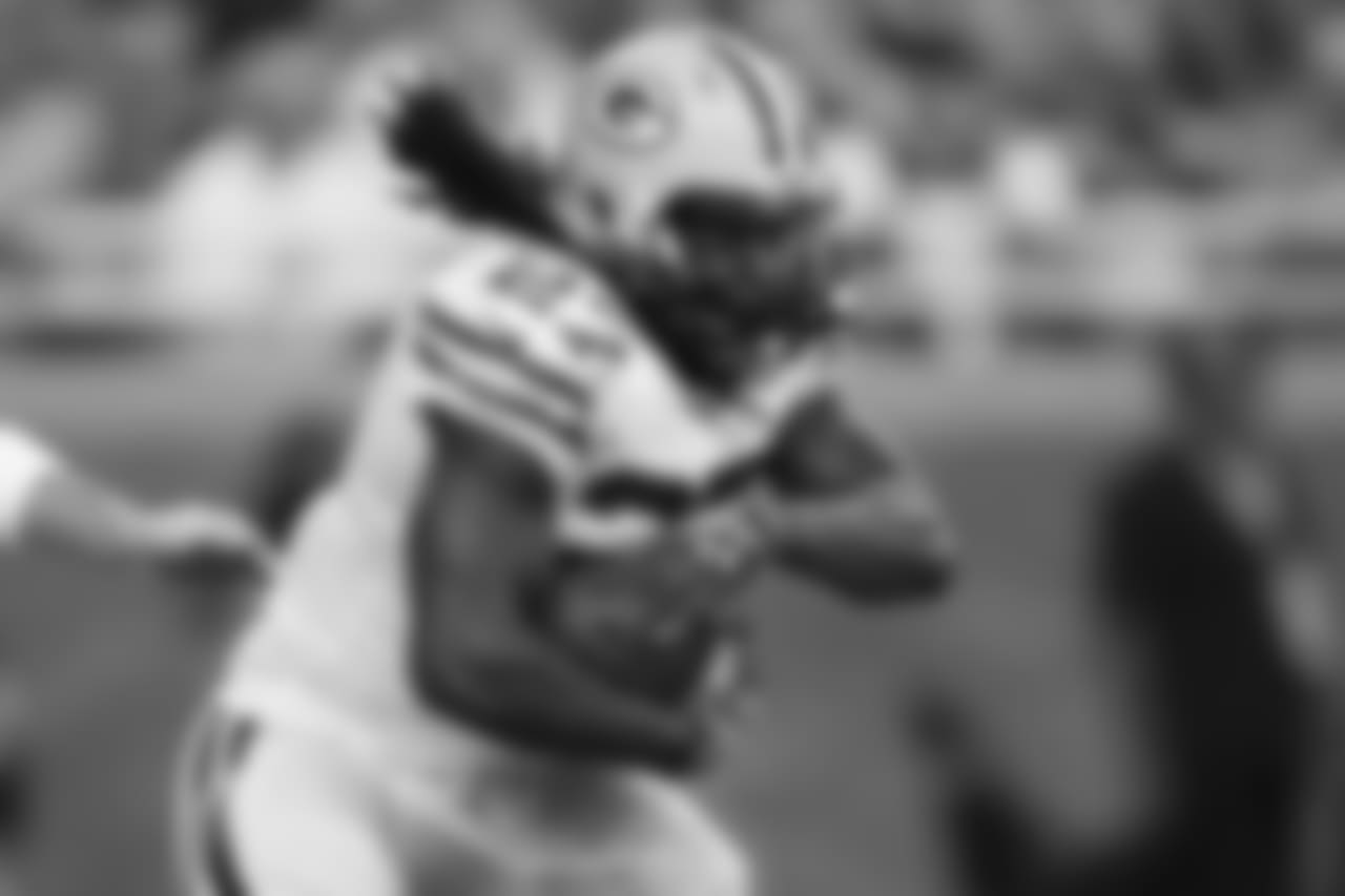 Green Bay Packers running back Eddie Lacy (27) rushes against the Detroit Lions during an NFL football game at Ford Field in Detroit, Sunday, Sept. 21, 2014. (AP Photo/Rick Osentoski)