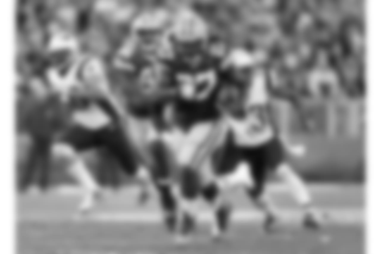Green Bay Packers running back Eddie Lacy (27) rushes for a gain during an NFL football game against the New England Patriots at Lambeau Field on Sunday, November 30, 2014 in Green Bay, WI. The Packers beat the Patriots 26-21. (AP Photo/Todd Rosenberg)