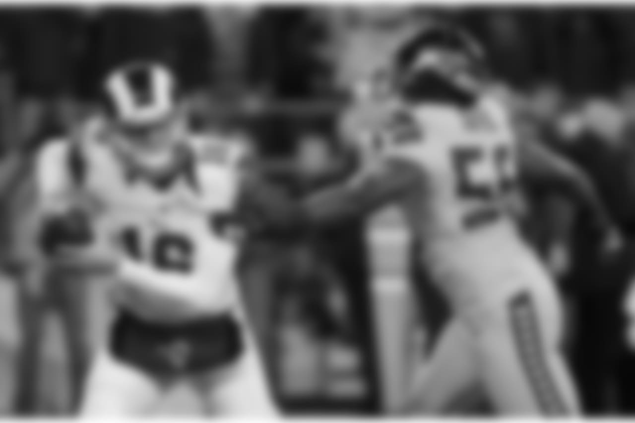 Seattle Seahawks defensive end Cliff Avril Cliff Avril, right, pressures Los Angeles Rams quarterback Jared Goff in the first half of an NFL football game, Thursday, Dec. 15, 2016, in Seattle. (AP Photo/Elaine Thompson)