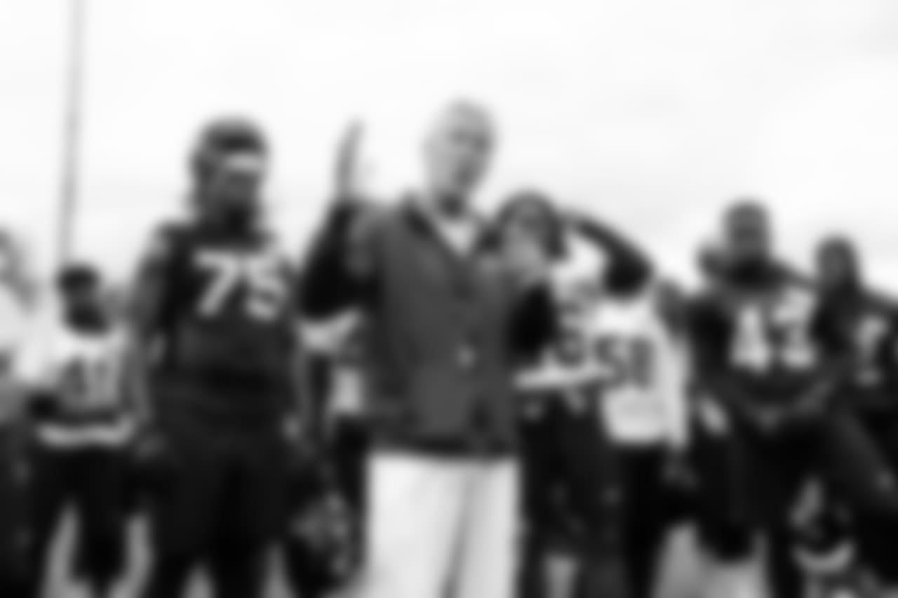 Head coach Pete Carroll addresses the team at the end of the final minicamp practice.