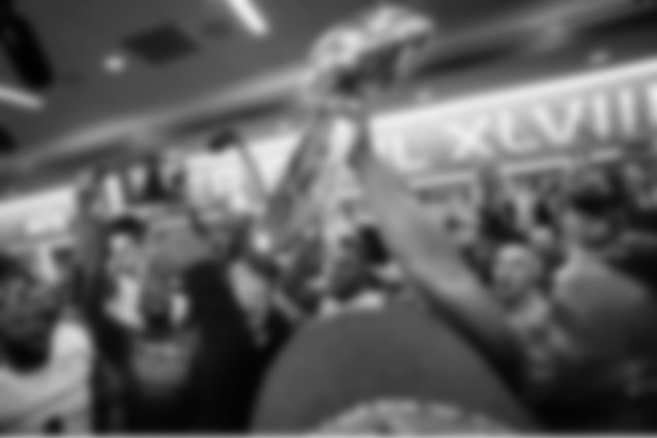 After finally getting the chance to gather the team, head coach Pete Carroll gave his players his postgame talk, then asked them to hold the Lombardi Trophy aloft one more time.