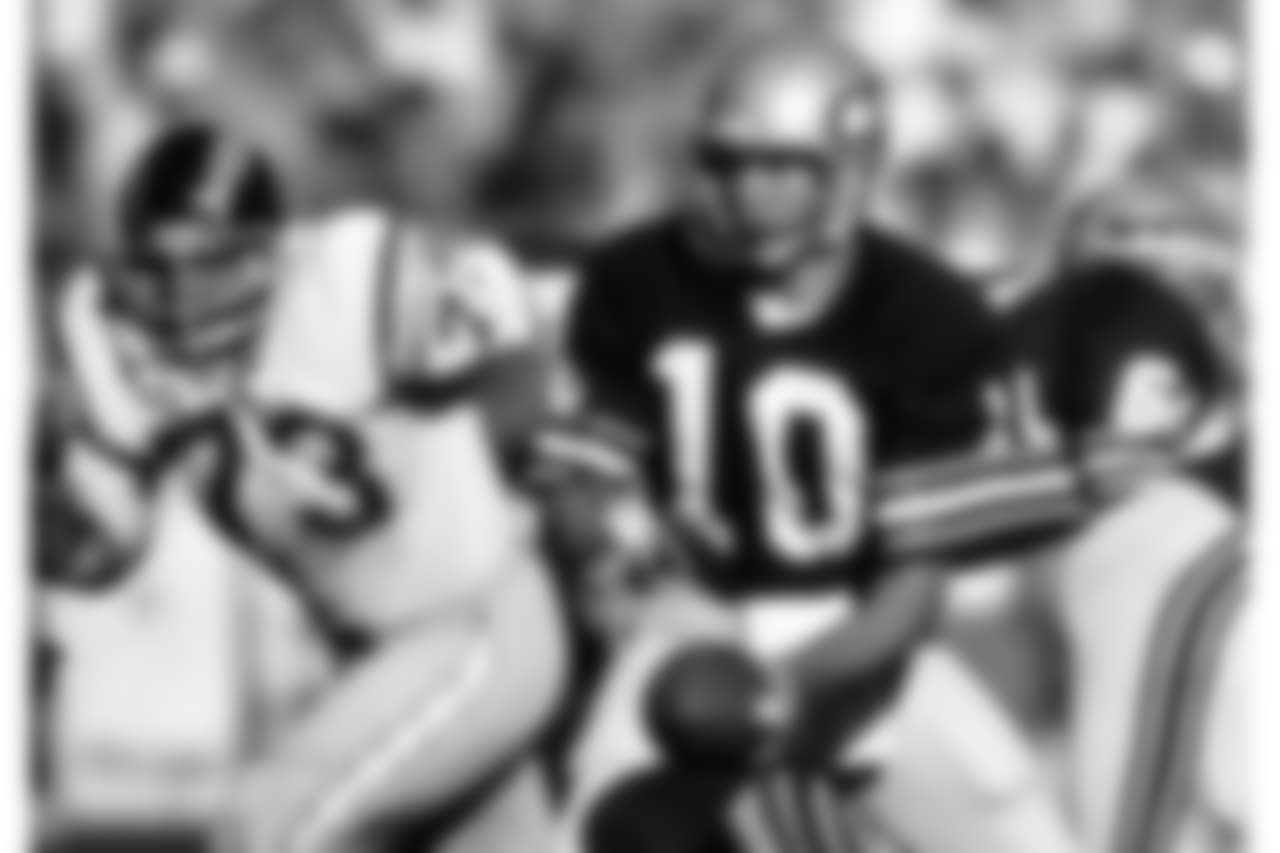 Seattle Seahawks quarterback Jim Zorn (10) sets to hand off in a 21 - 14 loss to the San Diego Chargers on Dec. 13, 1980 at San Diego Stadium in San Diego. (AP Photo / Al Messerschmidt)