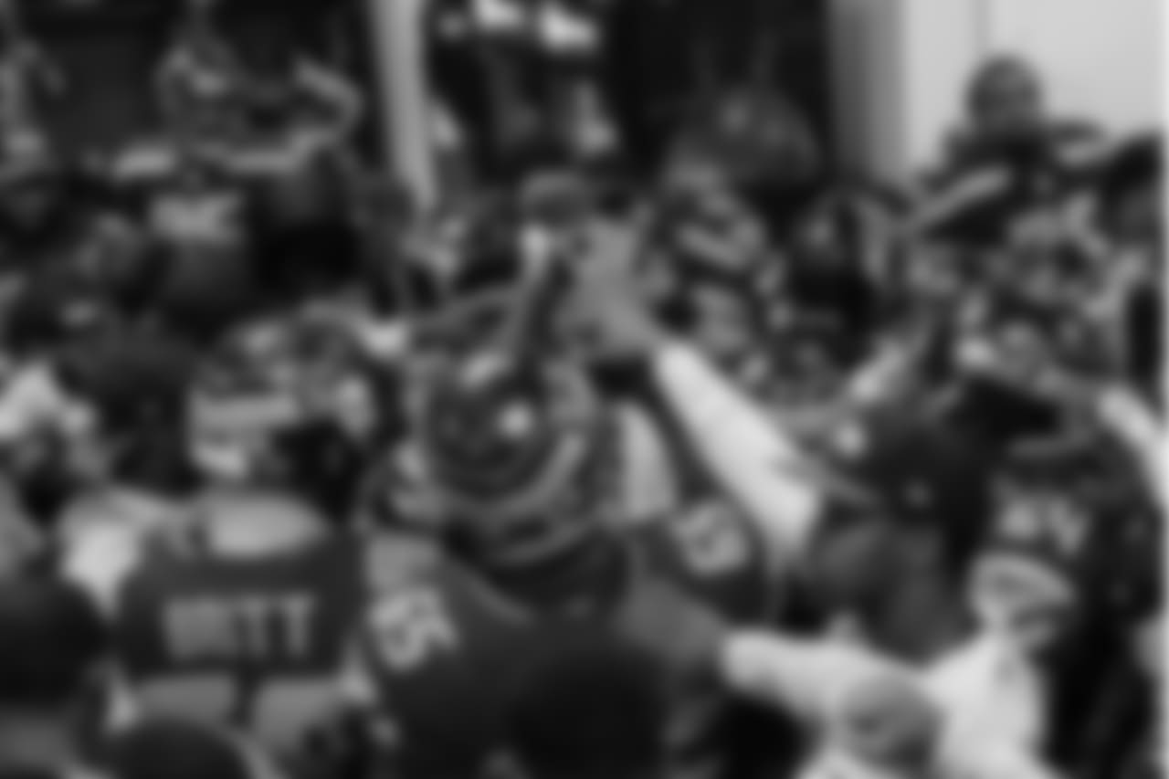 Back in the locker room, the Seahawks joined hands one last time before taking the field for the game.