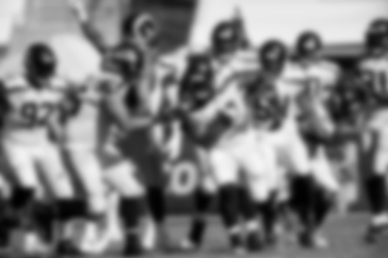 The Seahawks defense celebrates with defensive lineman Sheldon Richardson after his interception.