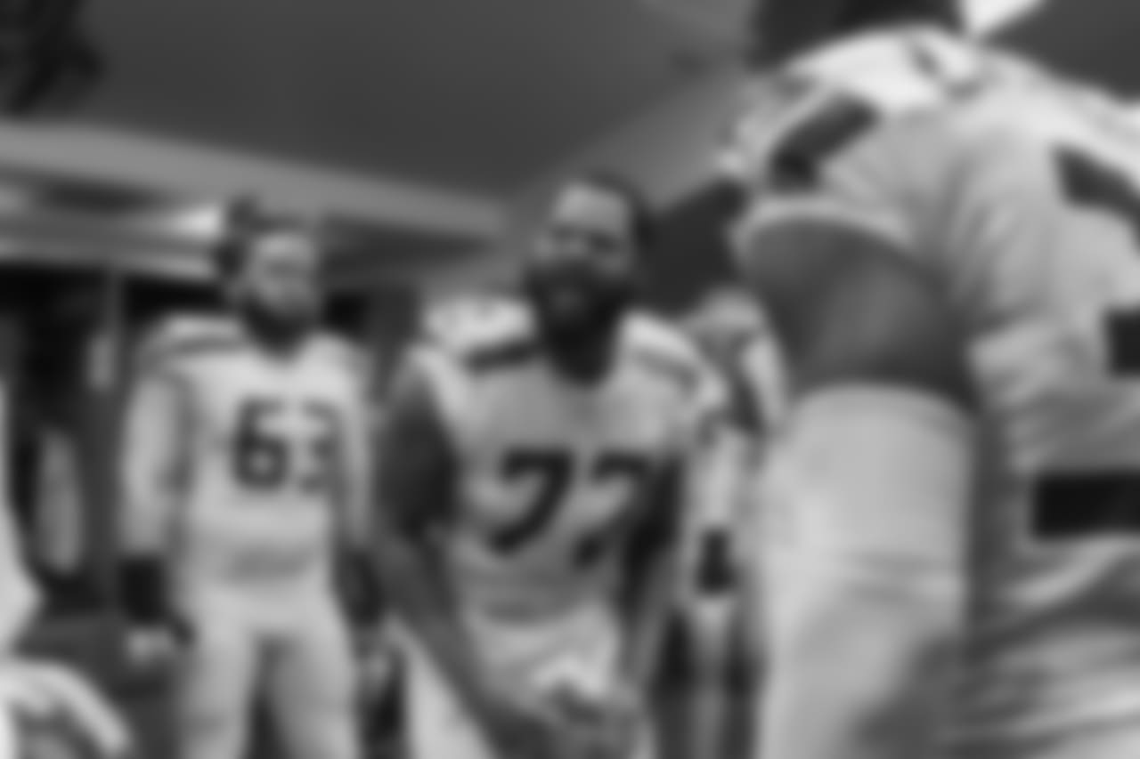 Michael Bennett gets his teammates pumped up before the game.